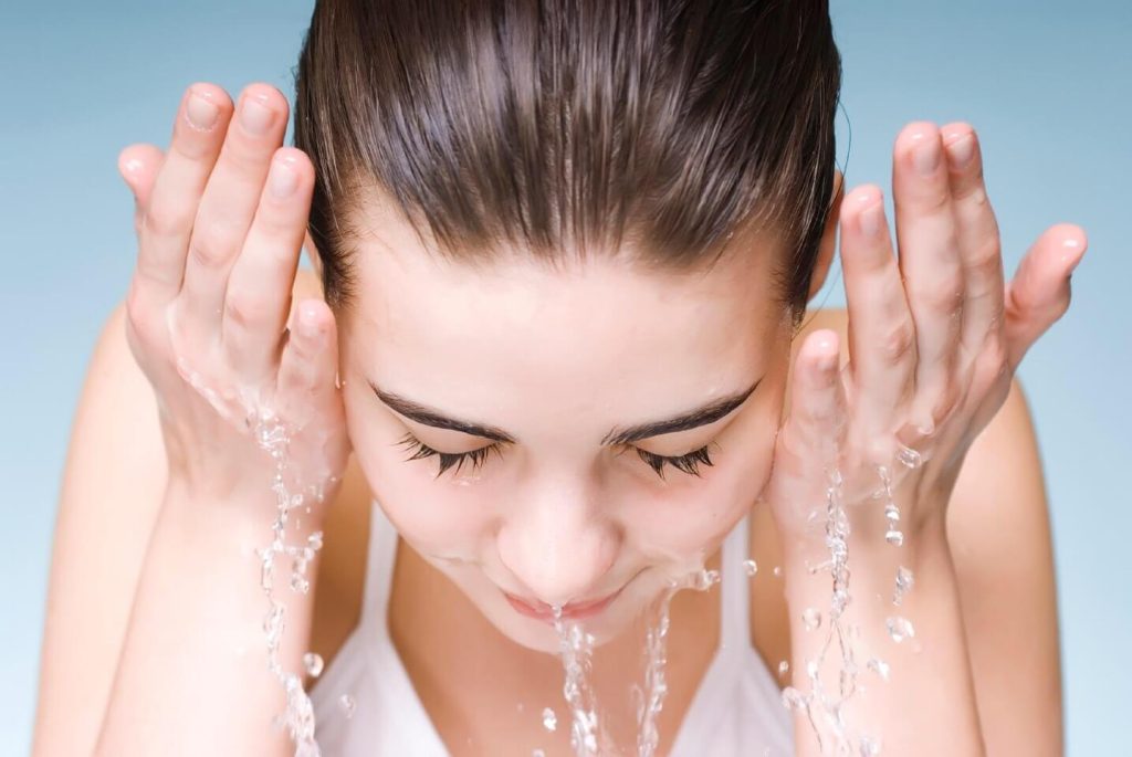 Wash & rinse face with warm water